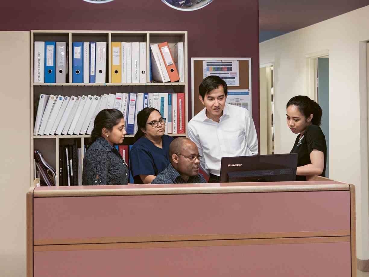 Dr. Sovann Kanitha and staff from the hospital Dr. Sovann Kanitha and staff from the hospital