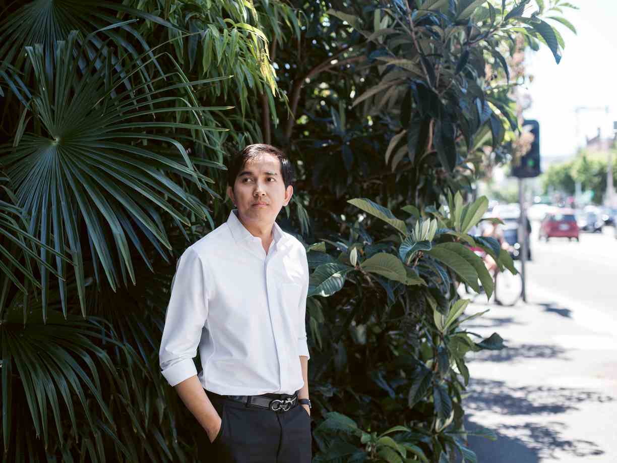 Dr. Sovann Kanitha Dr. Sovann Kanitha at a street corner in front of a palm tree